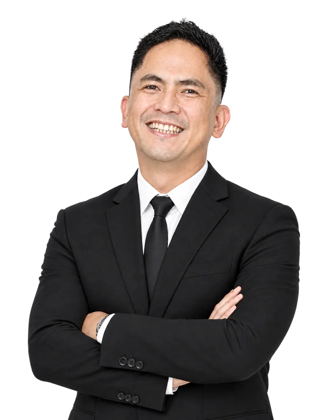Jaini Guevara, smiling, in a dark suit with arms crossed